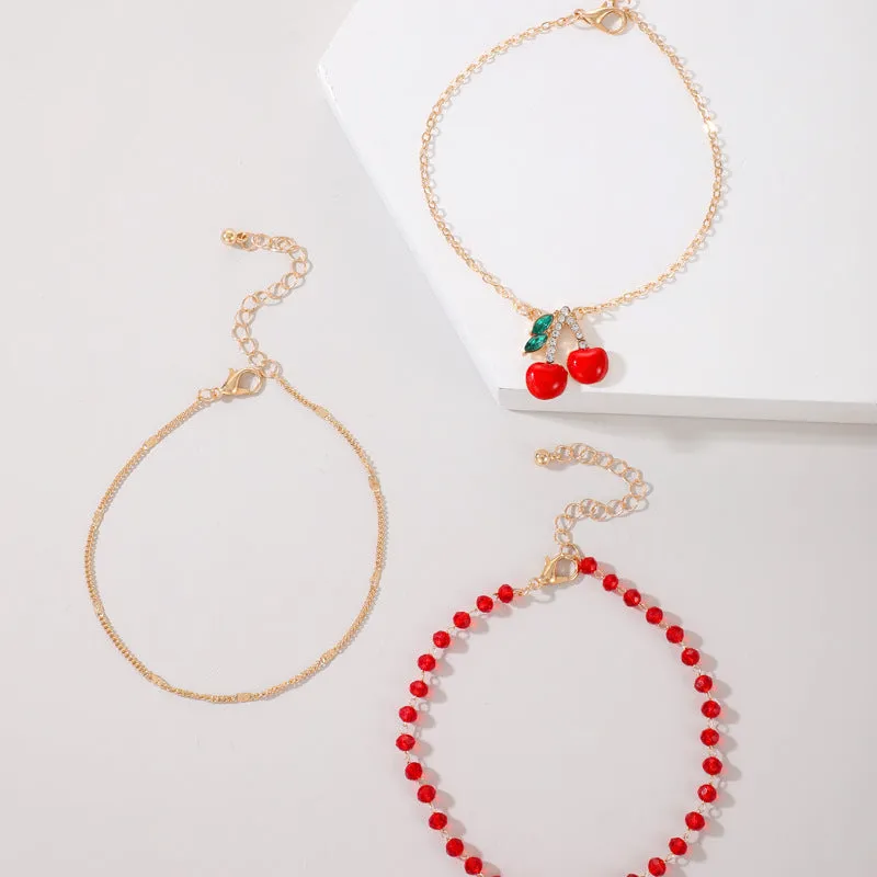 3-Piece Red Seed Bead & Cherry Blossom Anklet Set – Boho Multi-Layer Design