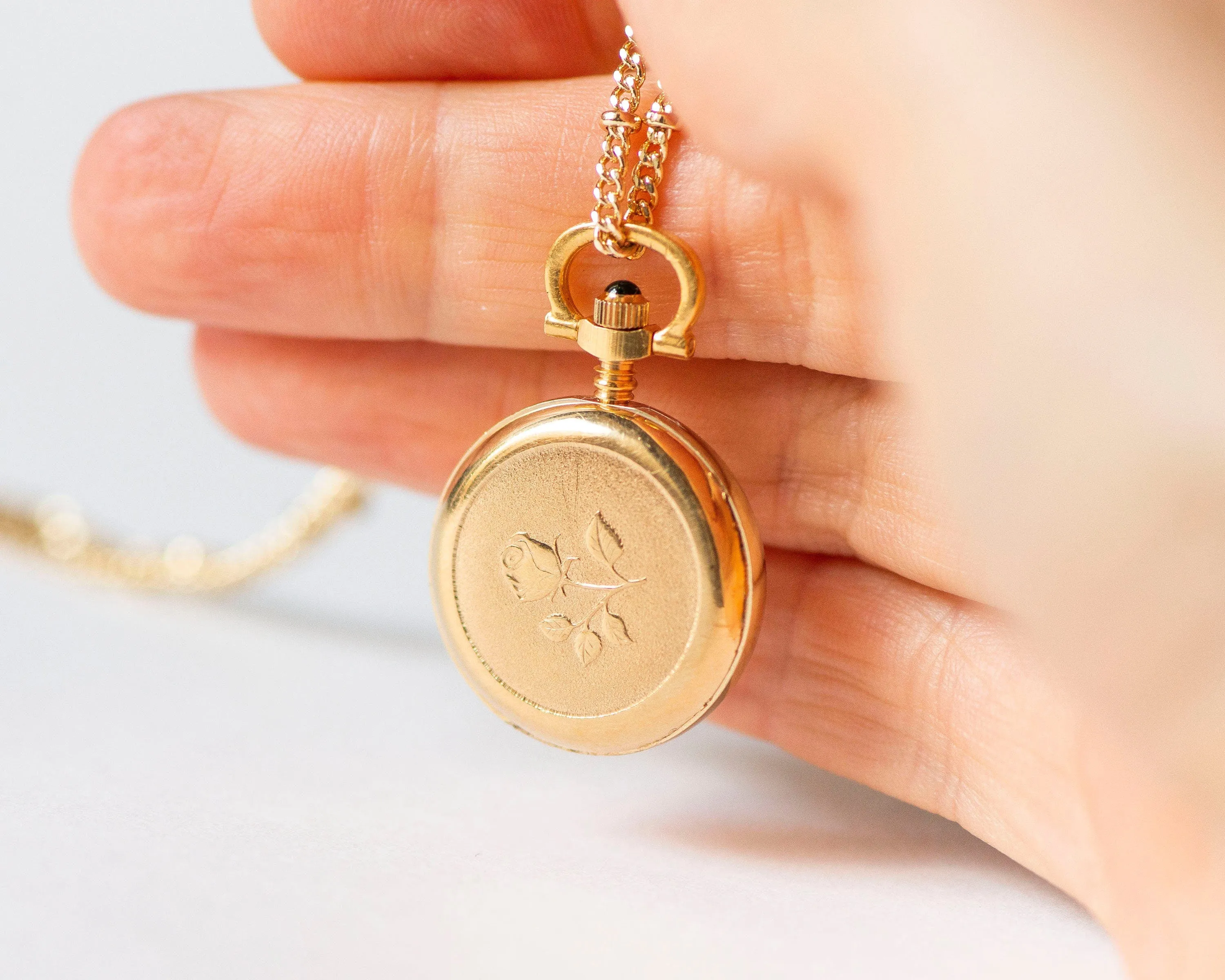 Boho necklace watch Dawn with rose pattern on backside, vintage gold plated pendant watch Roman numerals dial, delicate round neck accessory