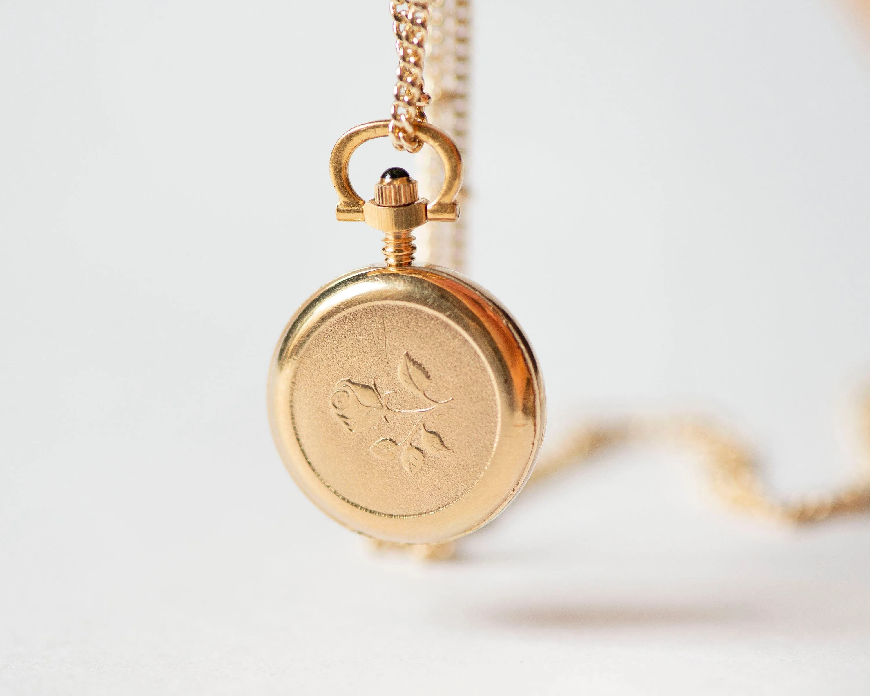 Boho necklace watch Dawn with rose pattern on backside, vintage gold plated pendant watch Roman numerals dial, delicate round neck accessory