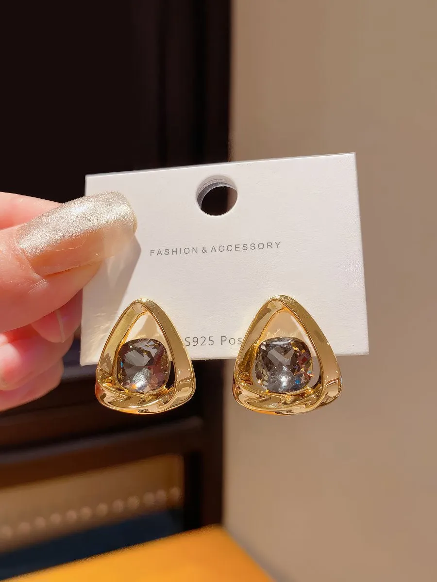 Chic Gold Tone Drop Earrings with Geometric Blue Smooth Accent