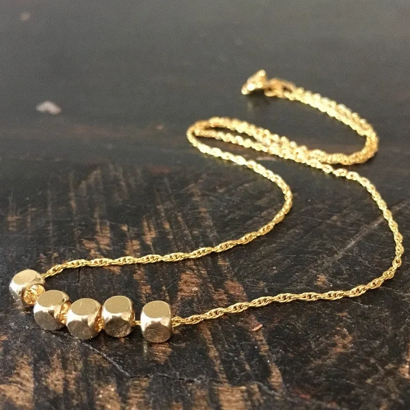 Gold Beads Necklace - The Fifth Element.