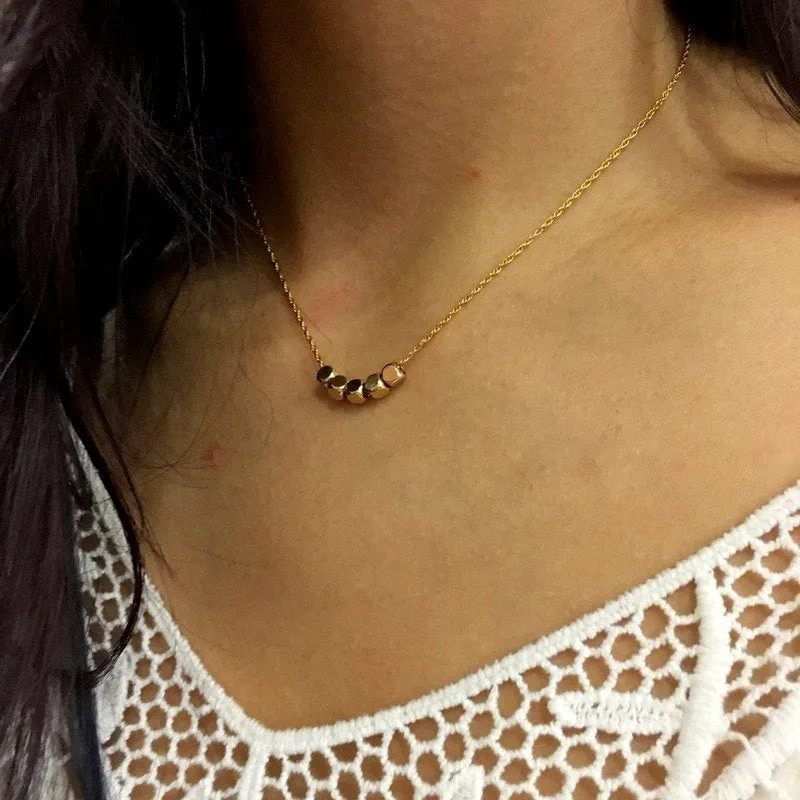 Gold Beads Necklace - The Fifth Element.