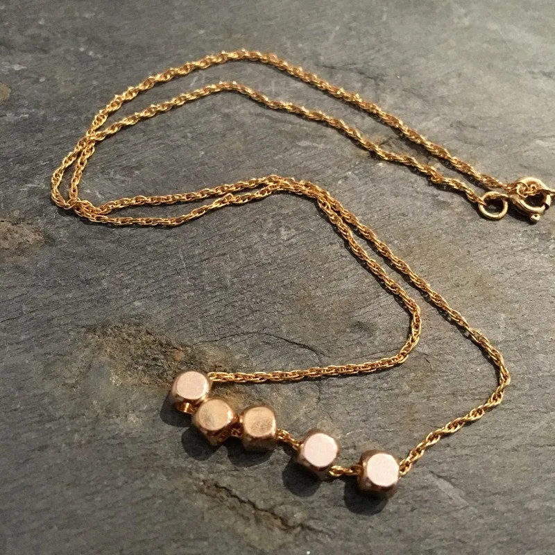 Gold Beads Necklace - The Fifth Element.
