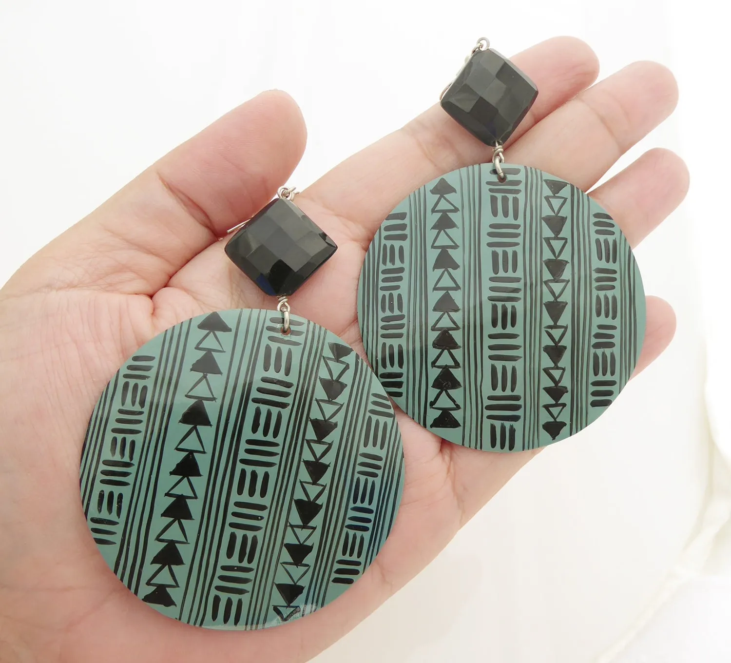 Green geometric shell earrings