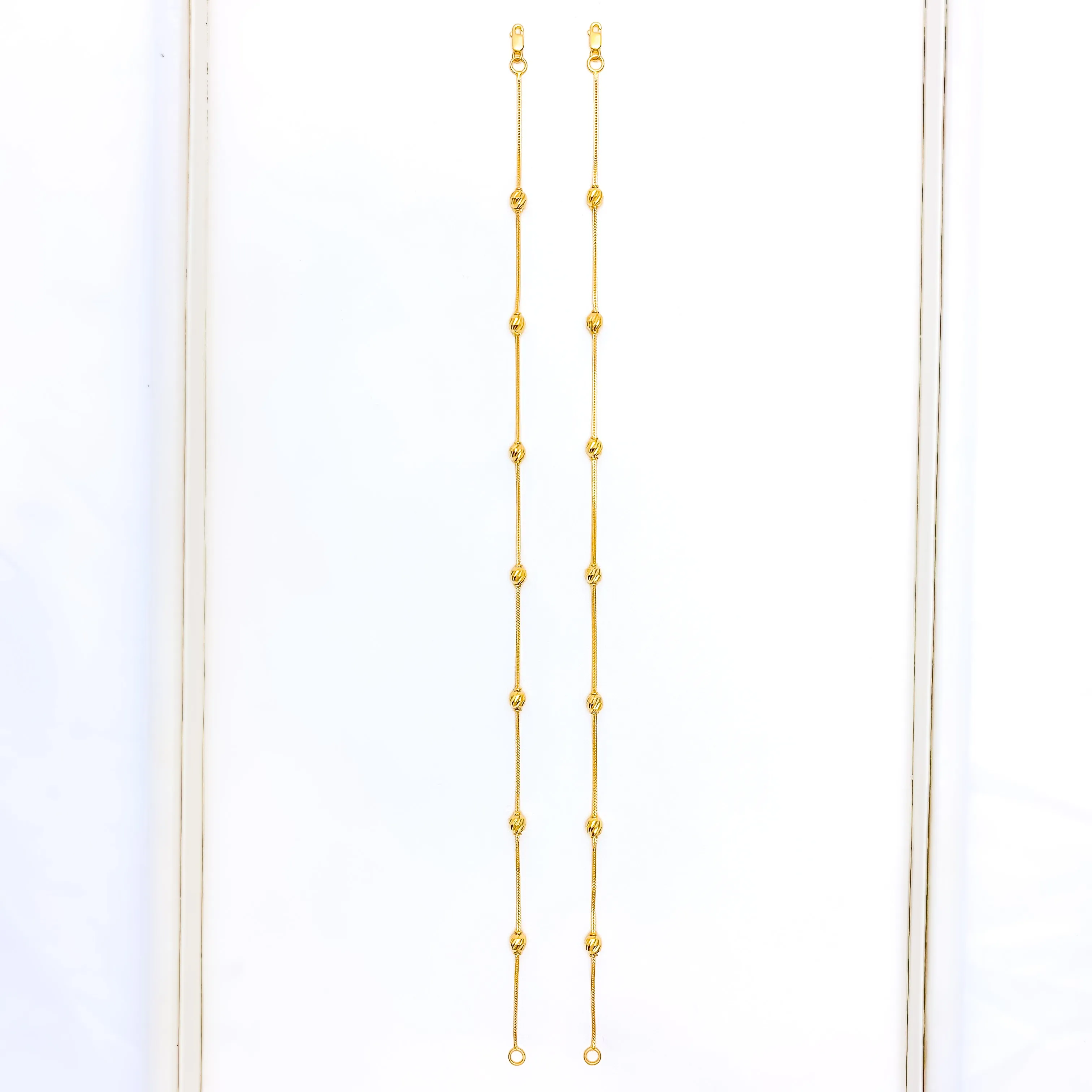Reflective Evergreen 21K Gold Orb Anklet Pair