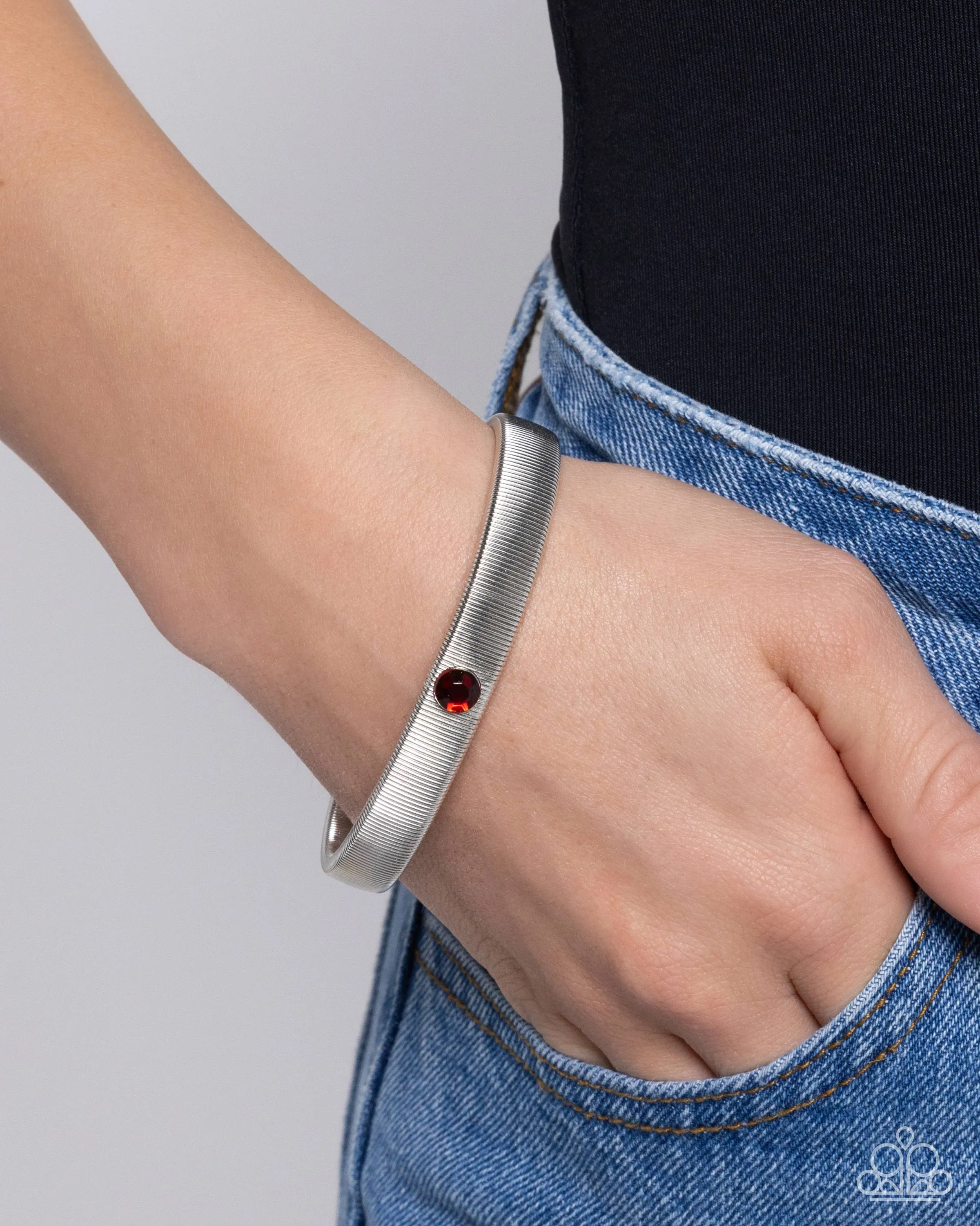 Surprising Solo - Red - Rhinestone Silver Band Paparazzi Stretchy Bracelet
