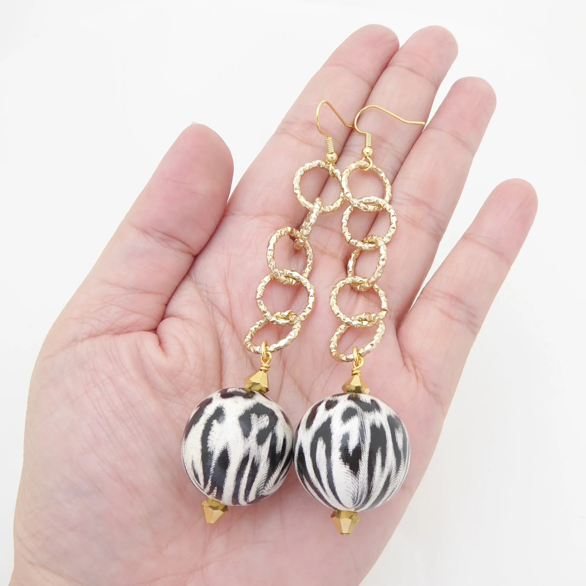 White jaguar earrings