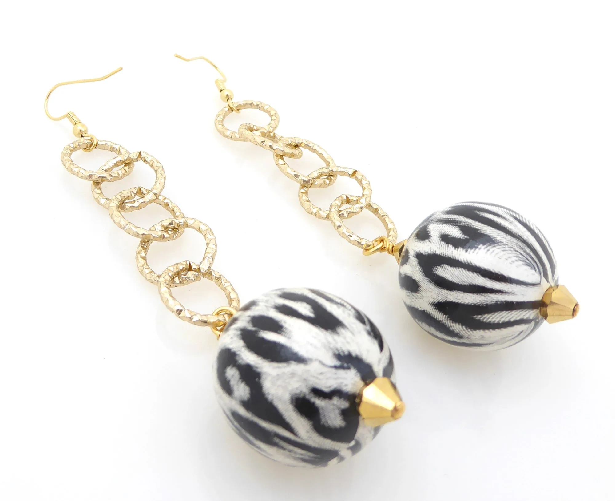 White jaguar earrings