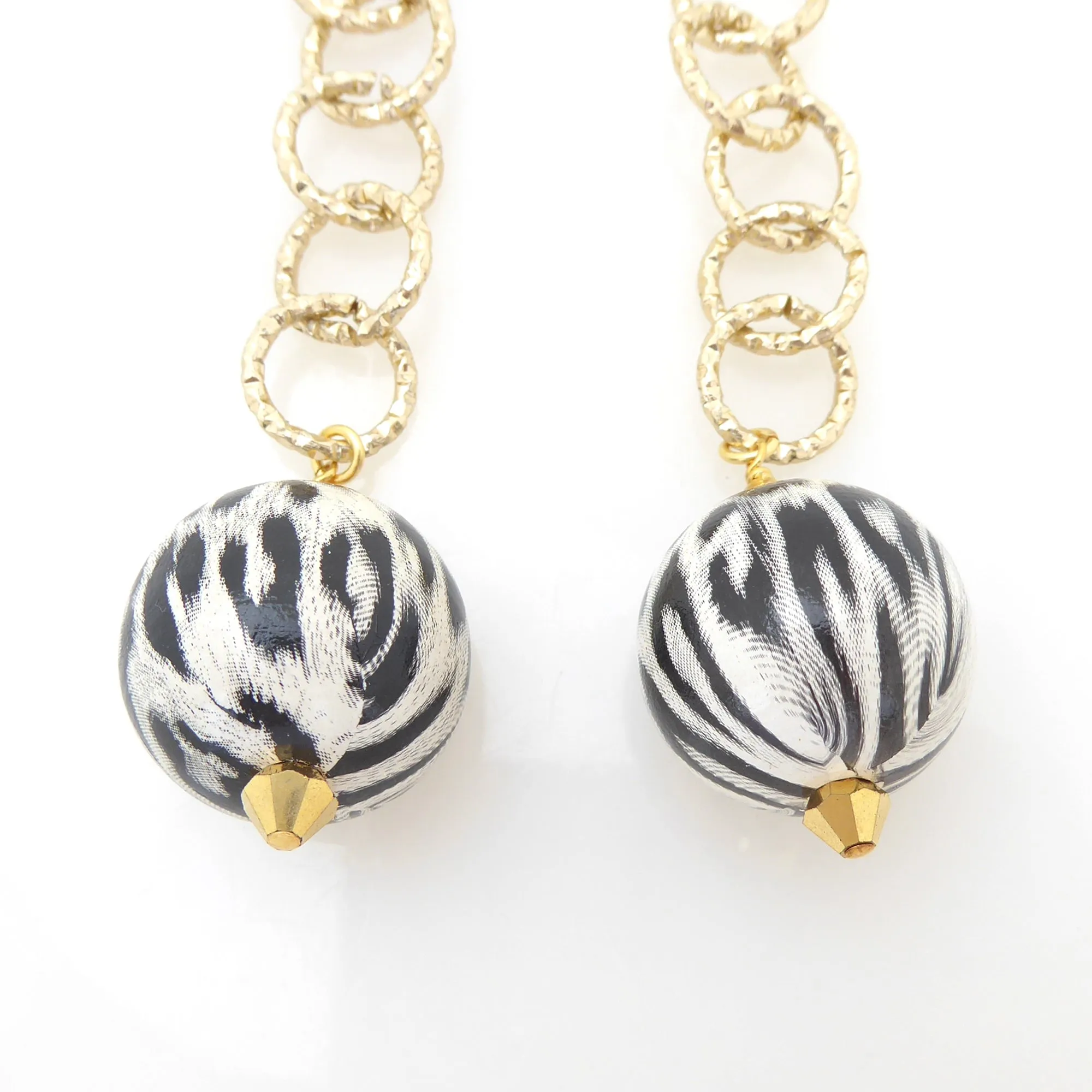 White jaguar earrings